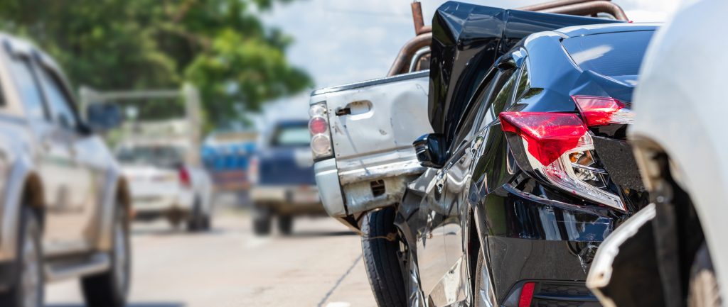 Cars involved in a rear-end accident on a city street