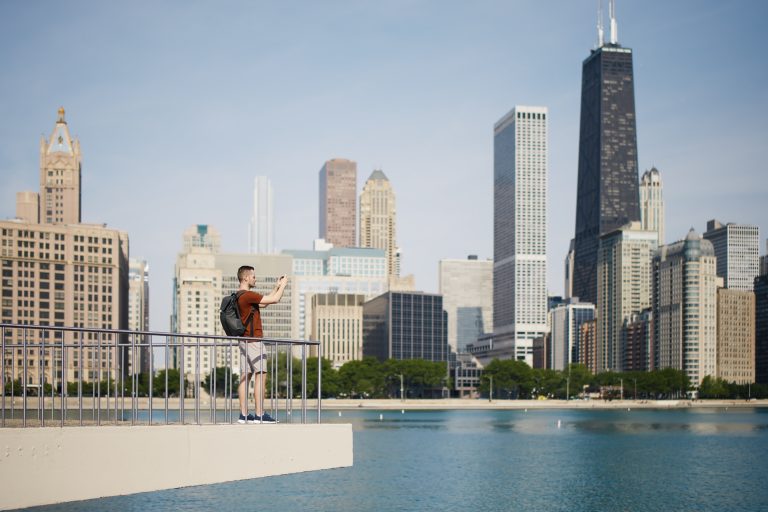 Exploring the role of tourism in car accidents, highlight some of Chicago’s major tourist spots, and provide information on upcoming events that may impact traffic.
