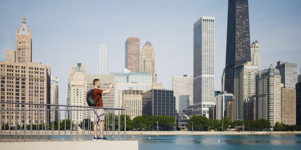 Exploring the role of tourism in car accidents, highlight some of Chicago’s major tourist spots, and provide information on upcoming events that may impact traffic.