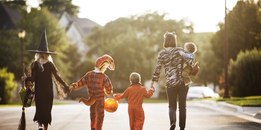 A family trick-or-treating in Joliet, Illinois.