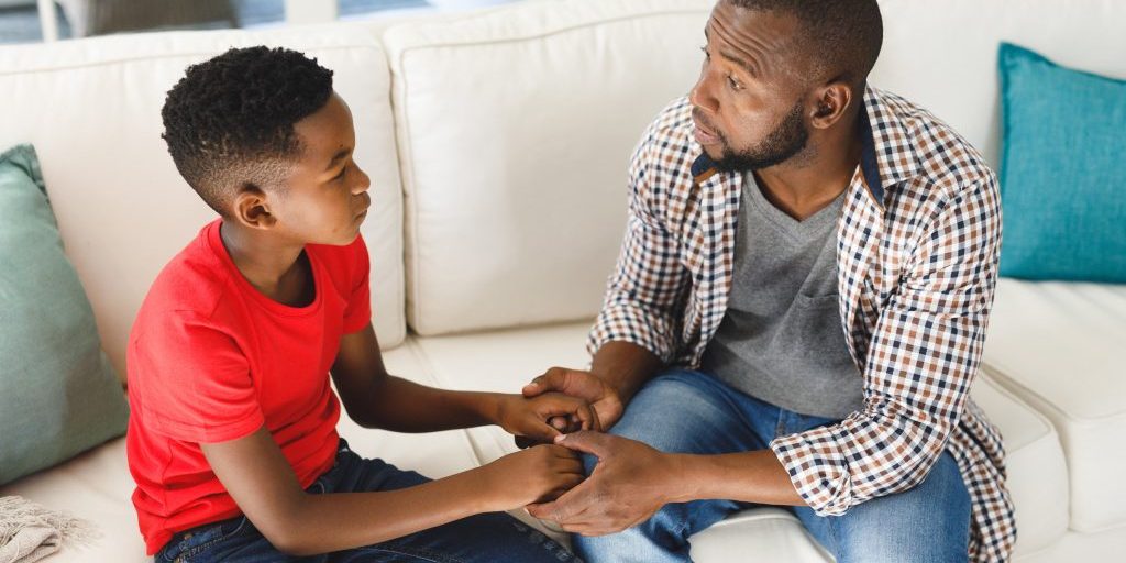Father and son having a conversation after a serious accident